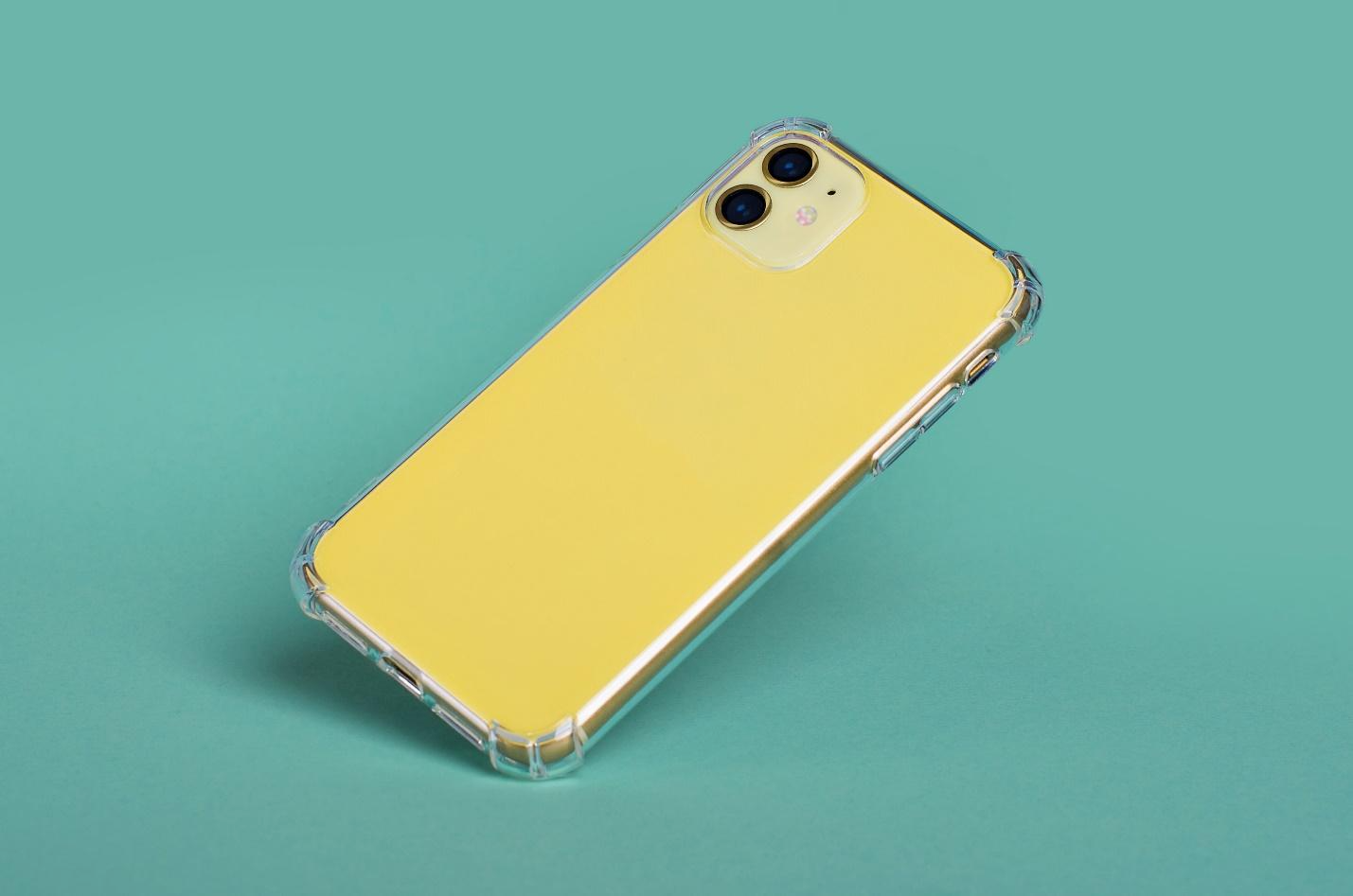 A yellow phone case on a blue background

Description automatically generated with low confidence